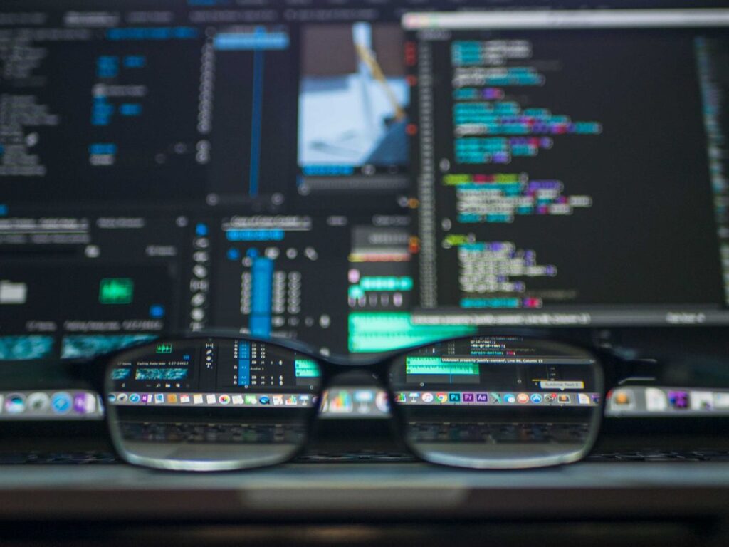 Developer fixing website code during a technical SEO recovery